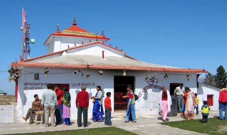 People walking outside a white Hindu temple under a blue sky